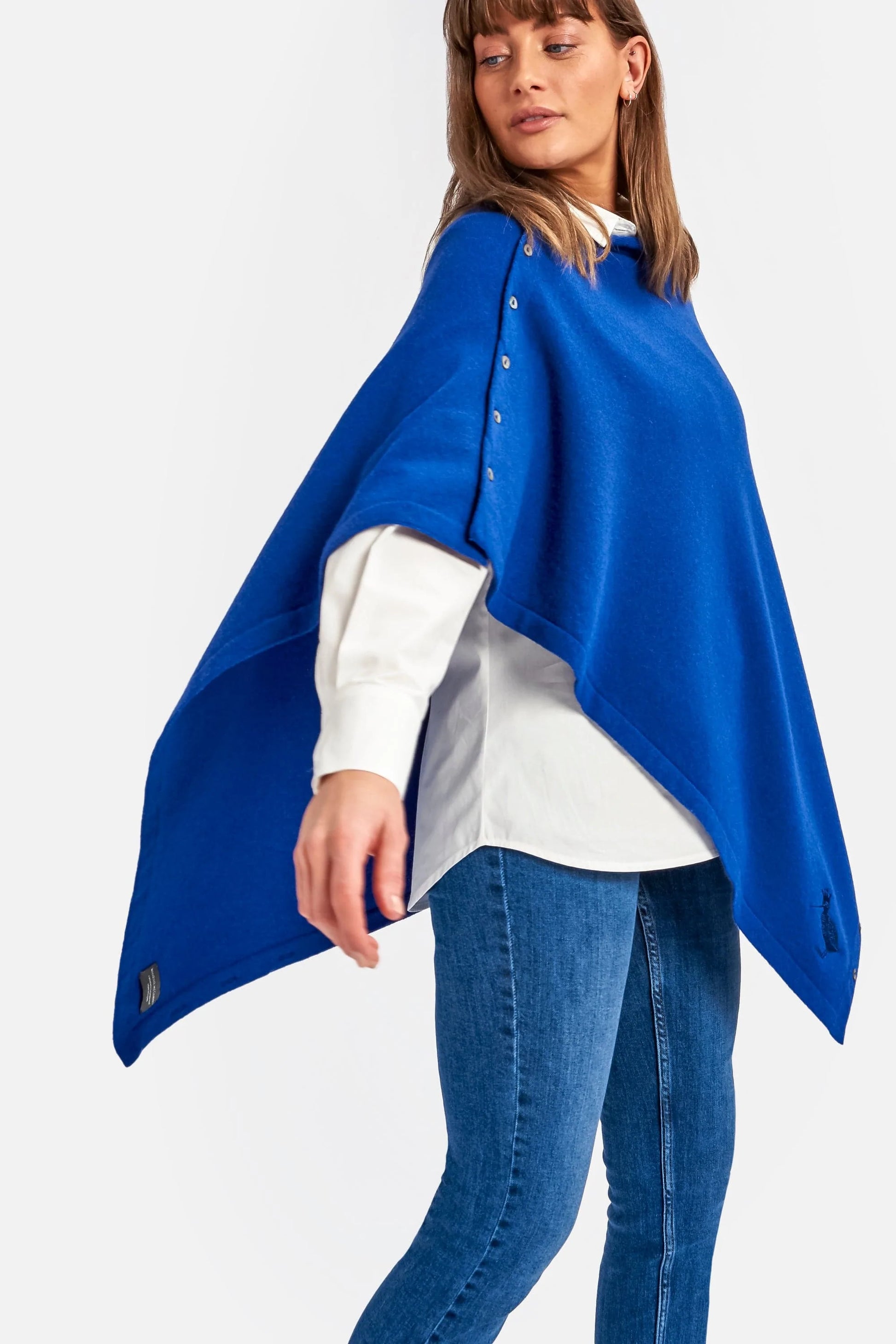 Cashmere & Merino Wool Short Length Button Poncho in Cobalt Blue by Woodcock & Cavendish for sale - Woodcock and Cavendish